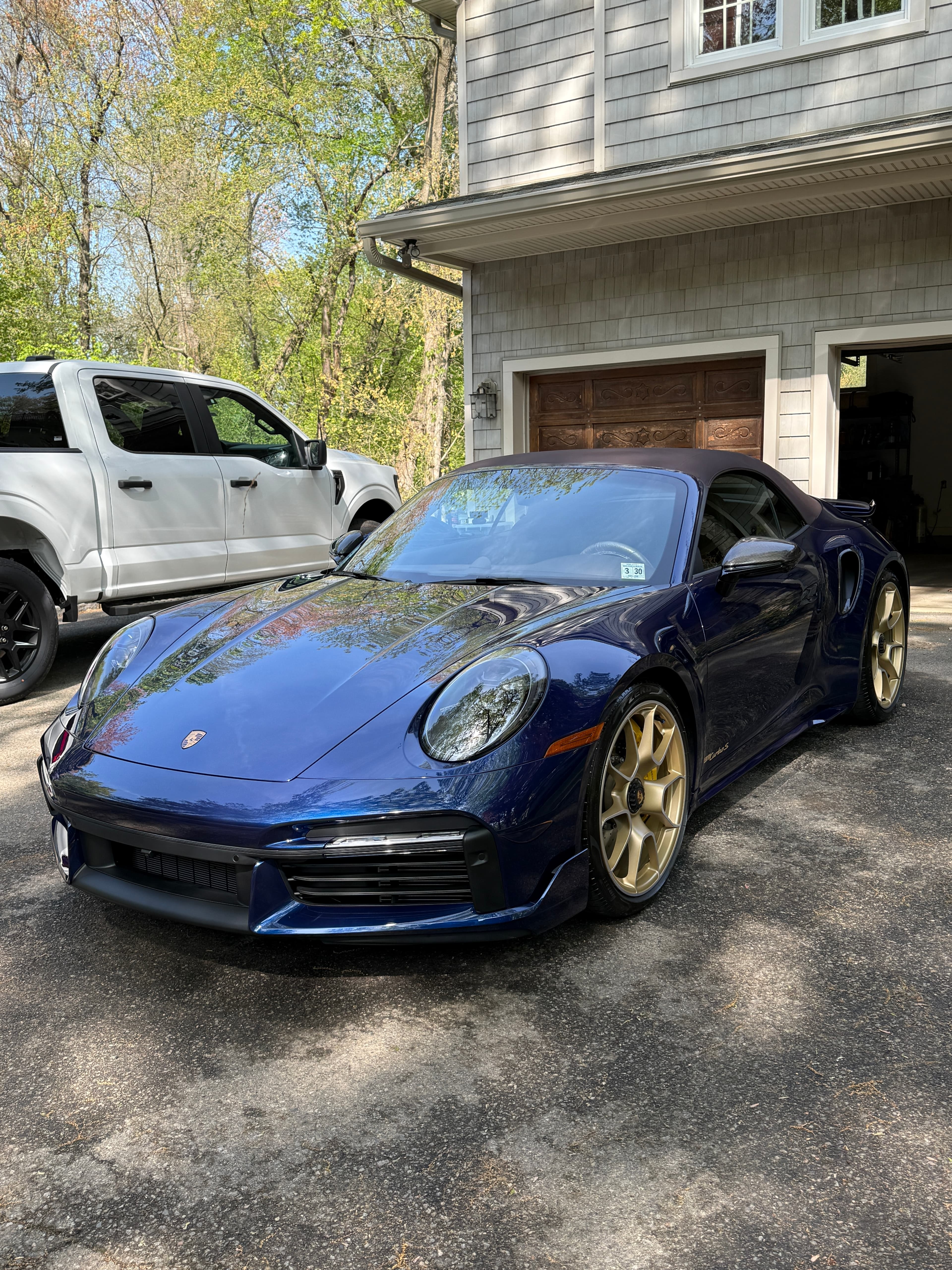 Navy blue Porsche 911 Turbo S cabriolet after a full detail