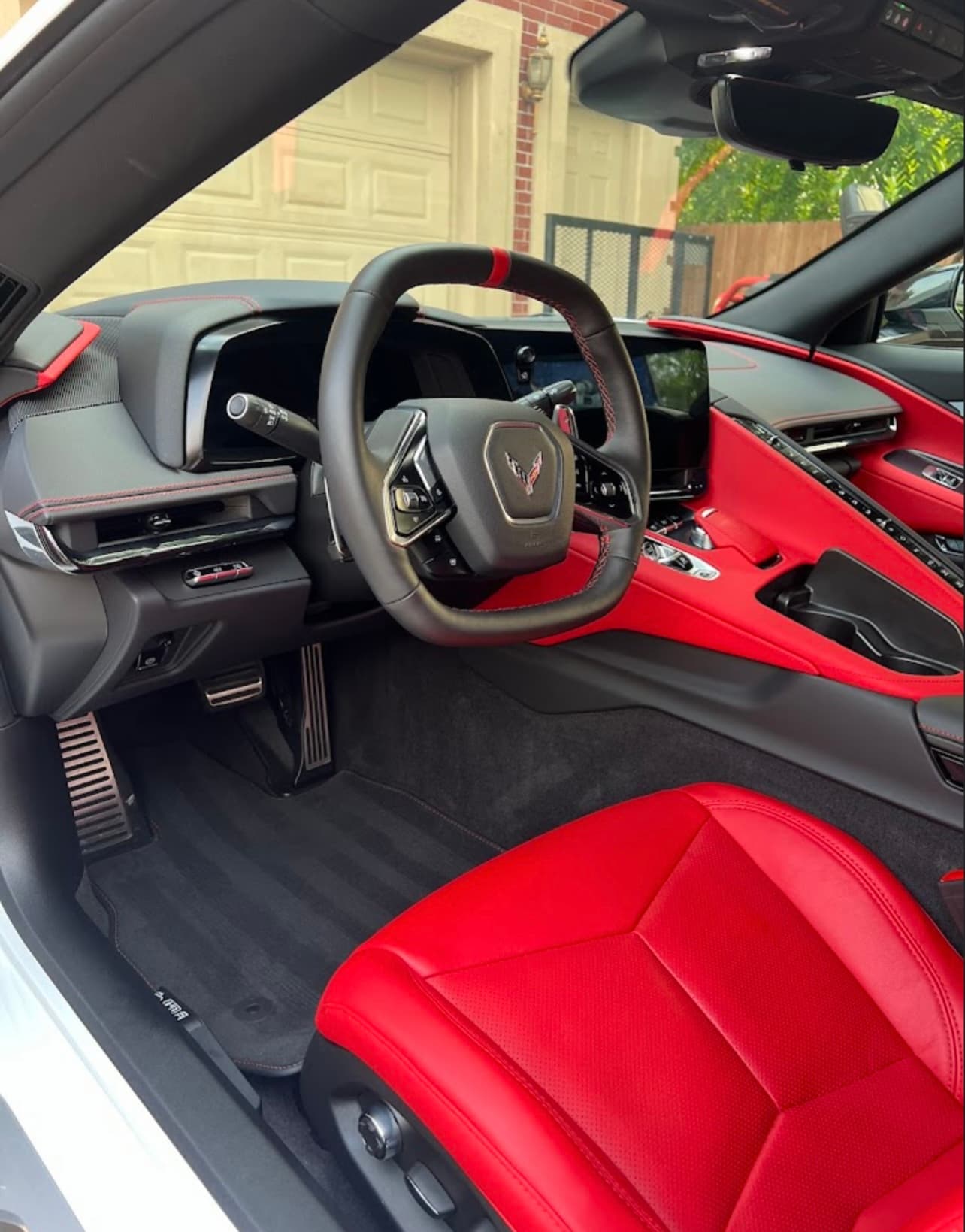 Red and white Chevrolet Corvette C8 interior after a deep interior detail