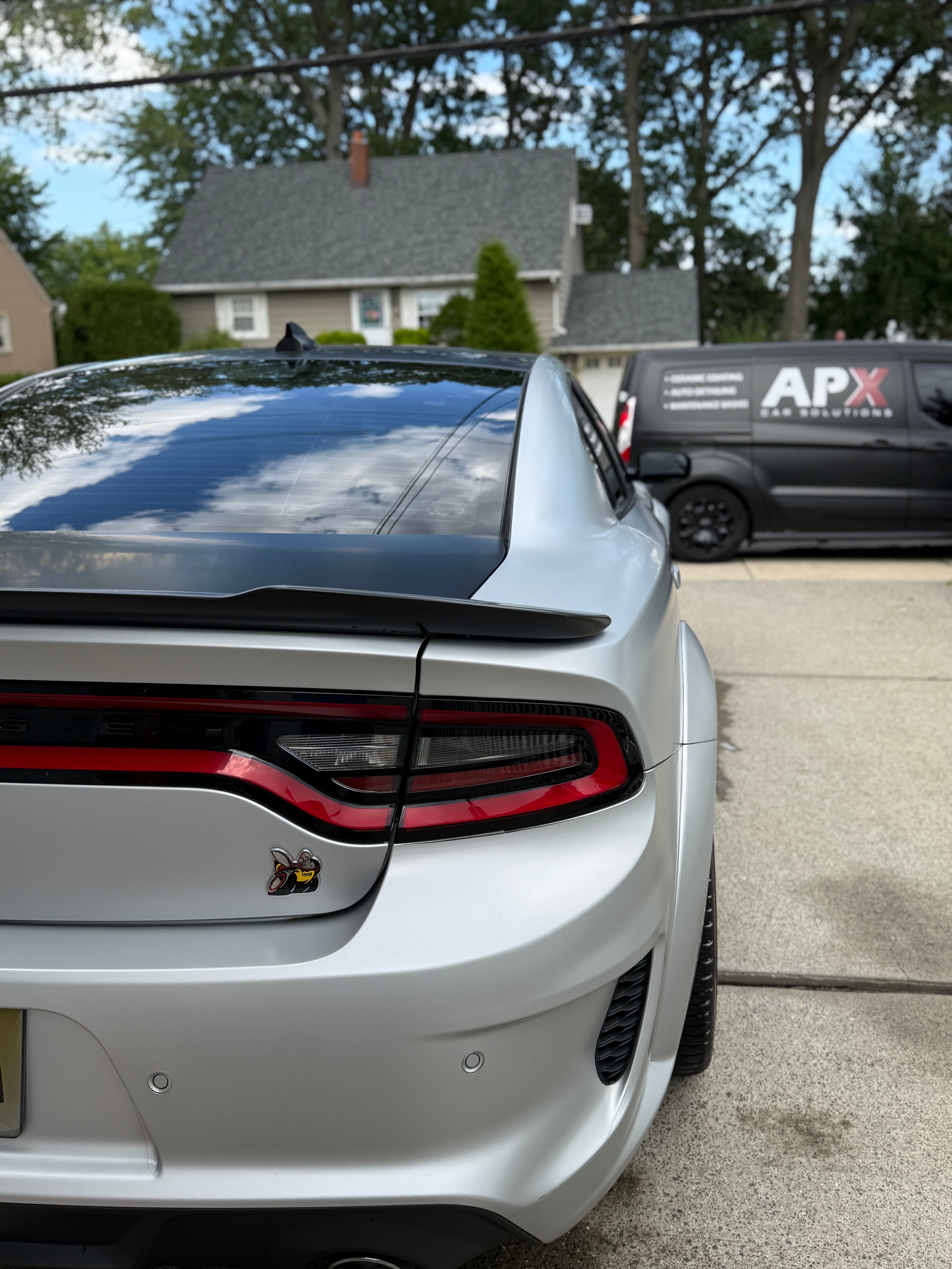 Silver Dodge Charger kept spotless on a recurring APX maintenance plan